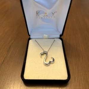 Kay Jewelers Jane Seymour‘s open heart sterling silver necklace